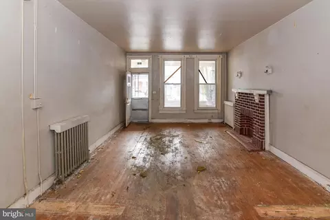Living - 512 E 35th St, Baltimore, MD 21218 photo 2 of 4