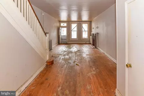 Living - 512 E 35th St, Baltimore, MD 21218 photo 3 of 4