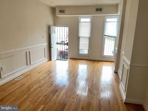 Living - 1118 Myrtle Ave, Baltimore, MD 21201 photo 2 of 5