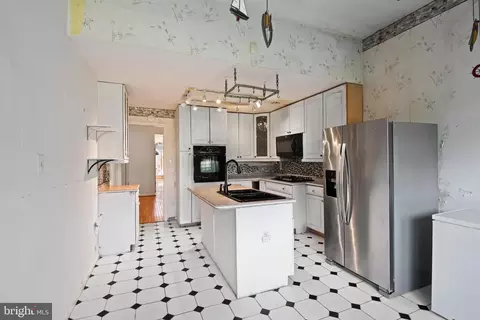 Kitchen - 2106 E Baltimore St, Baltimore, MD 21231 photo 2 of 4