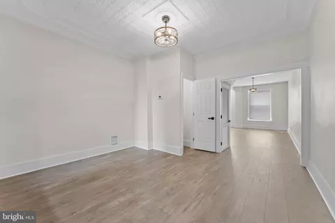 Living - 1838 E North Ave, Baltimore, MD 21213 photo 3 of 4