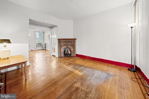 Living - 830 Whitmore Ave, Baltimore, MD 21216 photo 3 of 4