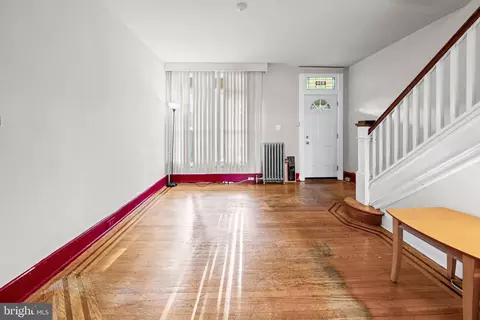 Living - 830 Whitmore Ave, Baltimore, MD 21216 photo 2 of 4