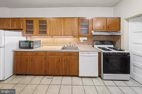 Kitchen - 830 Whitmore Ave, Baltimore, MD 21216 photo 2 of 2