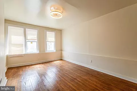 Living - 1135 Myrtle Ave, Baltimore, MD 21201 photo 3 of 3