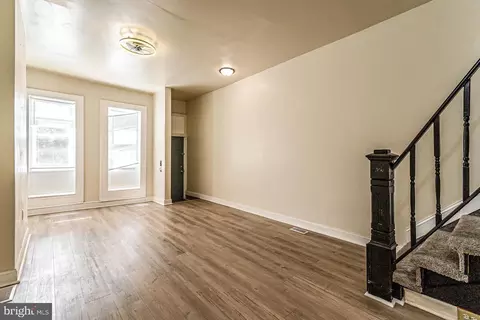 Living - 1135 Myrtle Ave, Baltimore, MD 21201 photo 1 of 3
