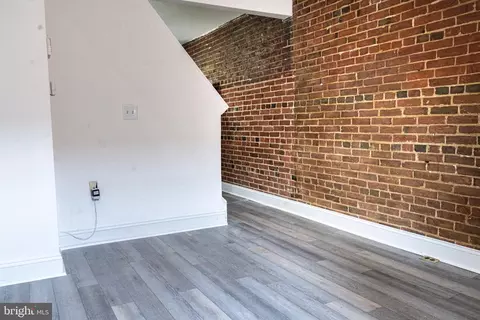 Living - 406 George St, Baltimore, MD 21201 photo 1 of 1