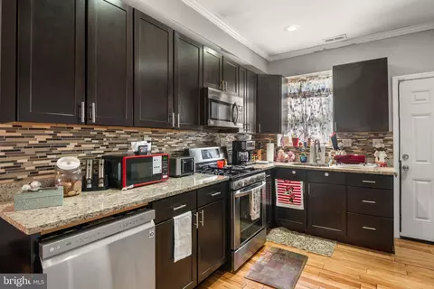 Kitchen - 307 N Monastery Ave, Baltimore, MD 21229 photo 2 of 3
