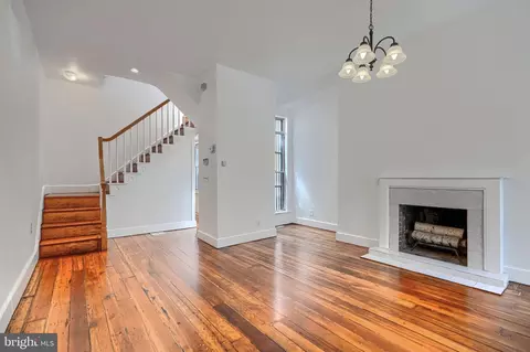 Living - 109 S Stricker St, Baltimore, MD 21223 photo 1 of 6