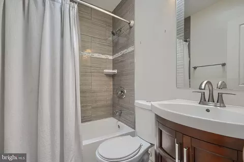 Bath - 138 S Clinton St, Baltimore, MD 21224 photo 1 of 9