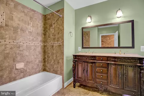 Bath - 404 E Lorraine Ave, Baltimore, MD 21218 photo 1 of 4