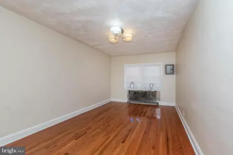 Living - 703 N Augusta Ave, Baltimore, MD 21229 photo 1 of 3
