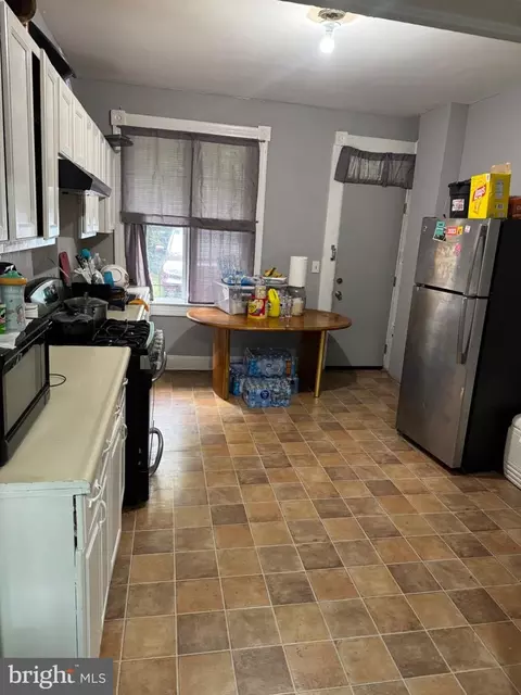 Kitchen - 1512 E 28th St E, Baltimore, MD 21218 photo 1 of 2