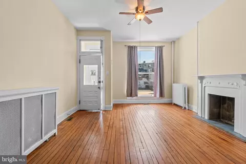 Living - 2500 N Calvert St, Baltimore, MD 21218 photo 1 of 4