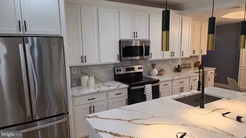 Kitchen - 2702 Cylburn Ave, Baltimore, MD 21215 photo 2 of 2