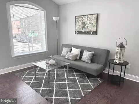 Living - 2621 E Monument St, Baltimore, MD 21205 photo 1 of 2