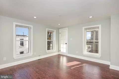 Living - 2621 E Monument St, Baltimore, MD 21205 photo 2 of 2