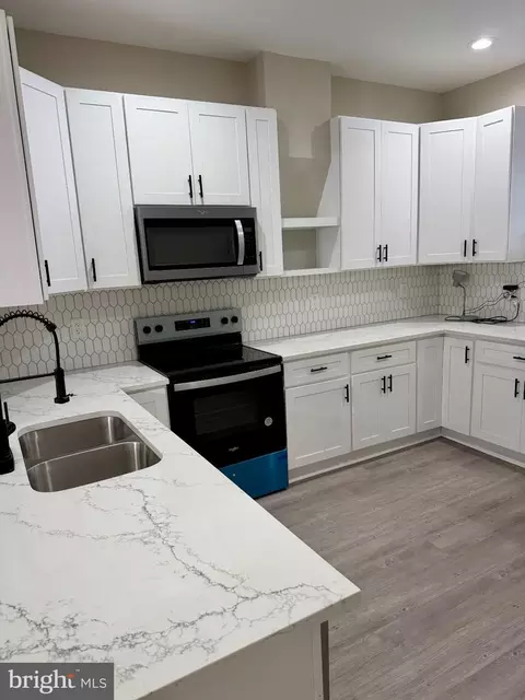 Kitchen - 1818 E Lafayette Ave, Baltimore, MD 21213 photo 2 of 3