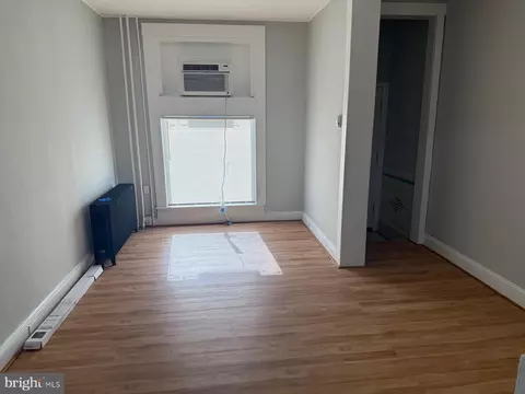 Living - 3016 E Monument St, Baltimore, MD 21205 photo 3 of 7