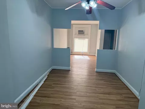 Living - 3016 E Monument St, Baltimore, MD 21205 photo 4 of 7