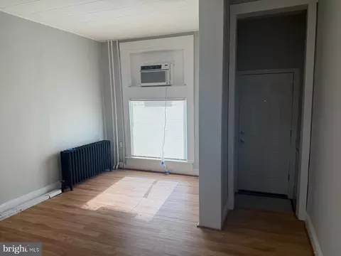 Living - 3016 E Monument St, Baltimore, MD 21205 photo 1 of 7
