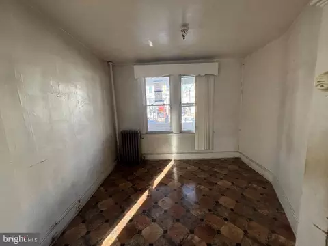 Living - 611 Cator Ave, Baltimore, MD 21218 photo 2 of 4