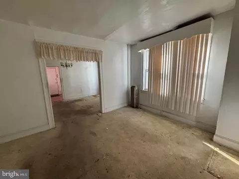 Living - 611 Cator Ave, Baltimore, MD 21218 photo 1 of 4