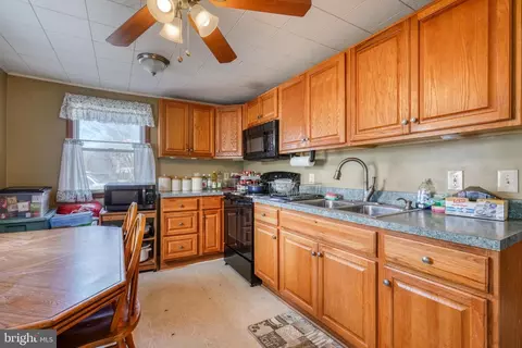 Kitchen - 8601 N Point Rd, Sparrows Point, MD 21219 photo 2 of 3