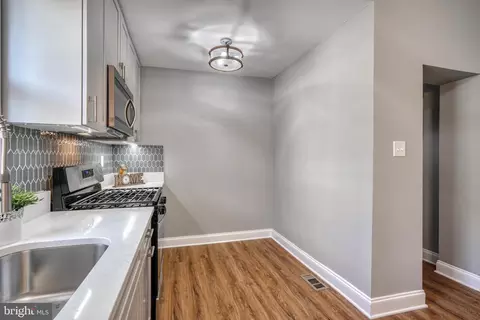 Kitchen - 2215 Sulphur Spring Rd, Halethorpe, MD 21227 photo 2 of 4