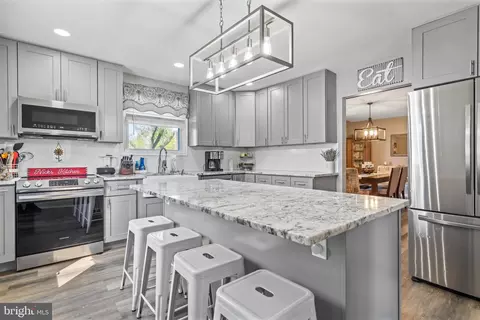 Kitchen - 411 Saint Patrick Rd, Baltimore, MD 21206 photo 2 of 5