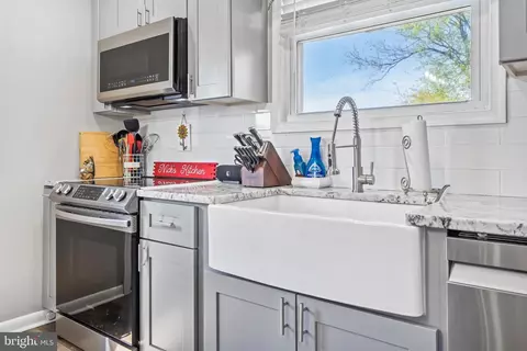 Kitchen - 411 Saint Patrick Rd, Baltimore, MD 21206 photo 4 of 5