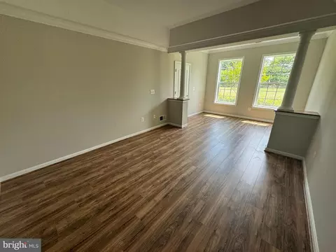 Living - 7101 Travertine Dr #105, Baltimore, MD 21209 photo 2 of 8