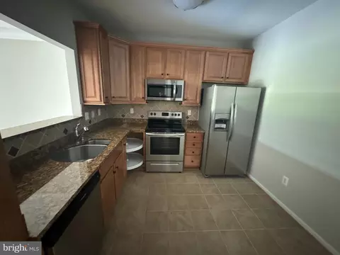 Kitchen - 7101 Travertine Dr #105, Baltimore, MD 21209 photo 1 of 2