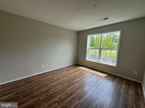 Living - 7101 Travertine Dr #105, Baltimore, MD 21209 photo 8 of 8