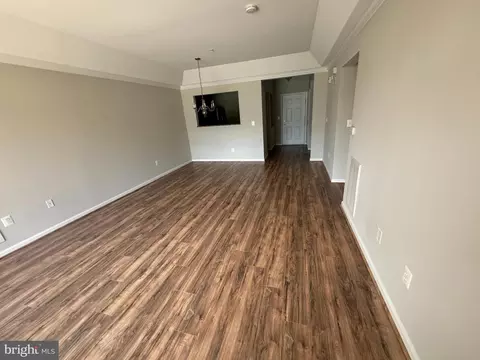 Living - 7101 Travertine Dr #105, Baltimore, MD 21209 photo 5 of 8