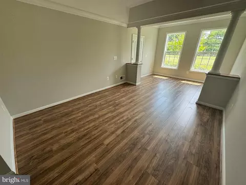 Living - 7101 Travertine Dr #105, Baltimore, MD 21209 photo 1 of 8