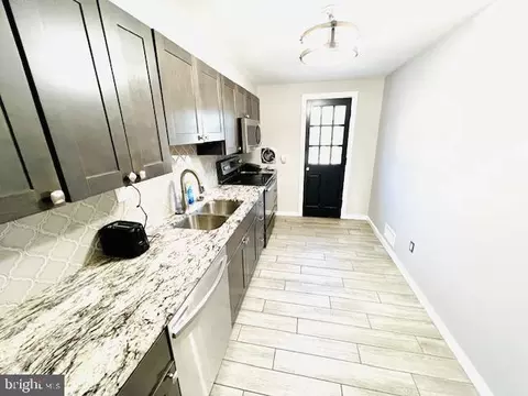 Kitchen - 972 Regina Dr, Halethorpe, MD 21227 photo 1 of 2