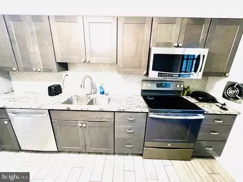 Kitchen - 972 Regina Dr, Halethorpe, MD 21227 photo 2 of 2