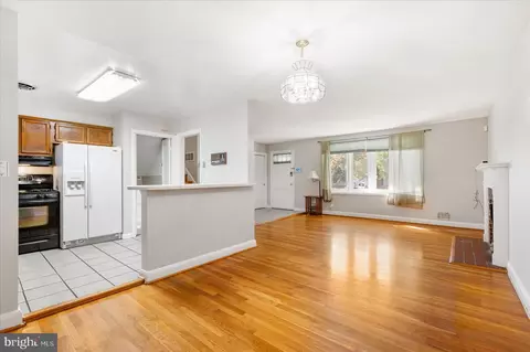 Living - 8342 Merrymount Dr, Windsor Mill, MD 21244 photo 7 of 17
