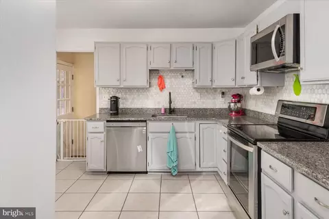 Kitchen - 5204 Larlin Rd, Halethorpe, MD 21227 photo 2 of 3