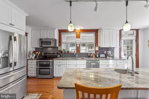 Kitchen - 6830 Windsor Mill Rd, Gwynn Oak, MD 21207 photo 2 of 5