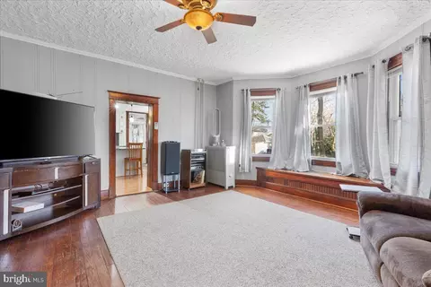 Living - 6830 Windsor Mill Rd, Gwynn Oak, MD 21207 photo 1 of 2
