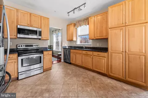 Kitchen - 7201 Travertine Dr #106, Baltimore, MD 21209 photo 2 of 4