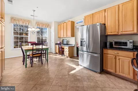 Kitchen - 7201 Travertine Dr #106, Baltimore, MD 21209 photo 4 of 4