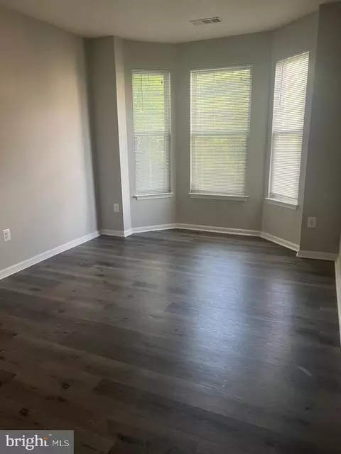 Living - 7412 Hindon Cir #103, Baltimore, MD 21244 photo 1 of 5