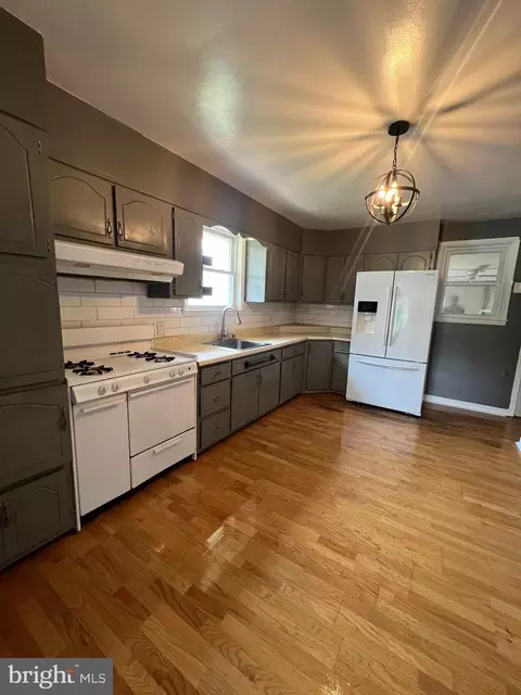 Kitchen - 8211 Beach Dr, Dundalk, MD 21222 photo 1 of 2