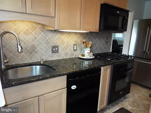 Kitchen - 5486 Oakland Rd, Halethorpe, MD 21227 photo 3 of 4