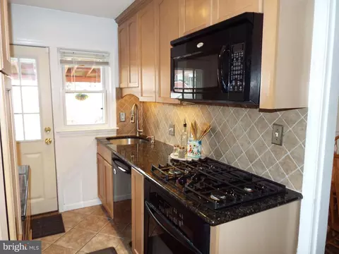 Kitchen - 5486 Oakland Rd, Halethorpe, MD 21227 photo 1 of 4