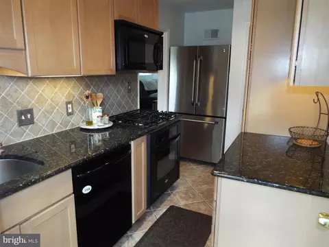 Kitchen - 5486 Oakland Rd, Halethorpe, MD 21227 photo 4 of 4