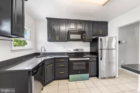 Kitchen - 7006 Paris Rd, Baltimore, MD 21207 photo 1 of 2